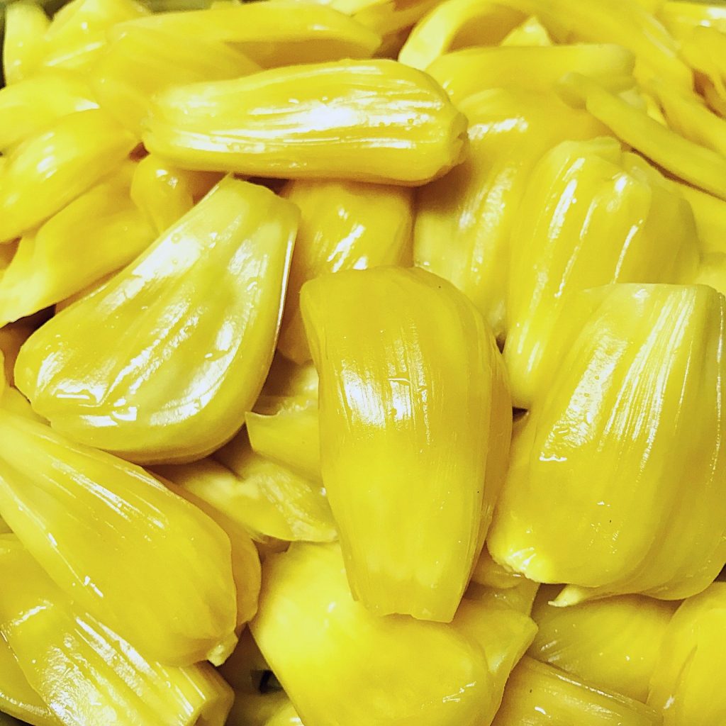 Bright yellow jackfruit wedges as meat alternative for starting a vegan challenge