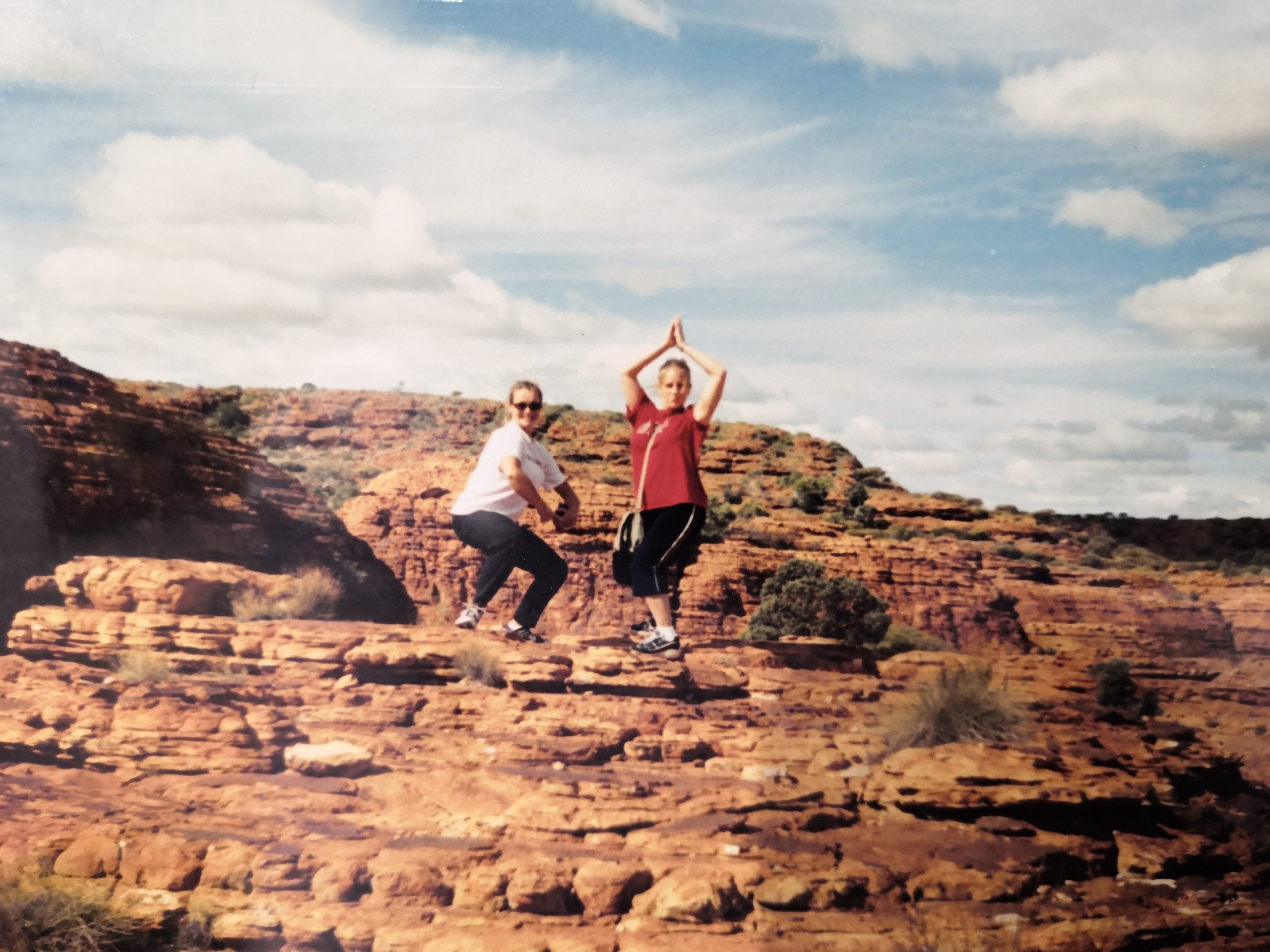 Silly poses on top of Kings Canyon in the Australian Outback