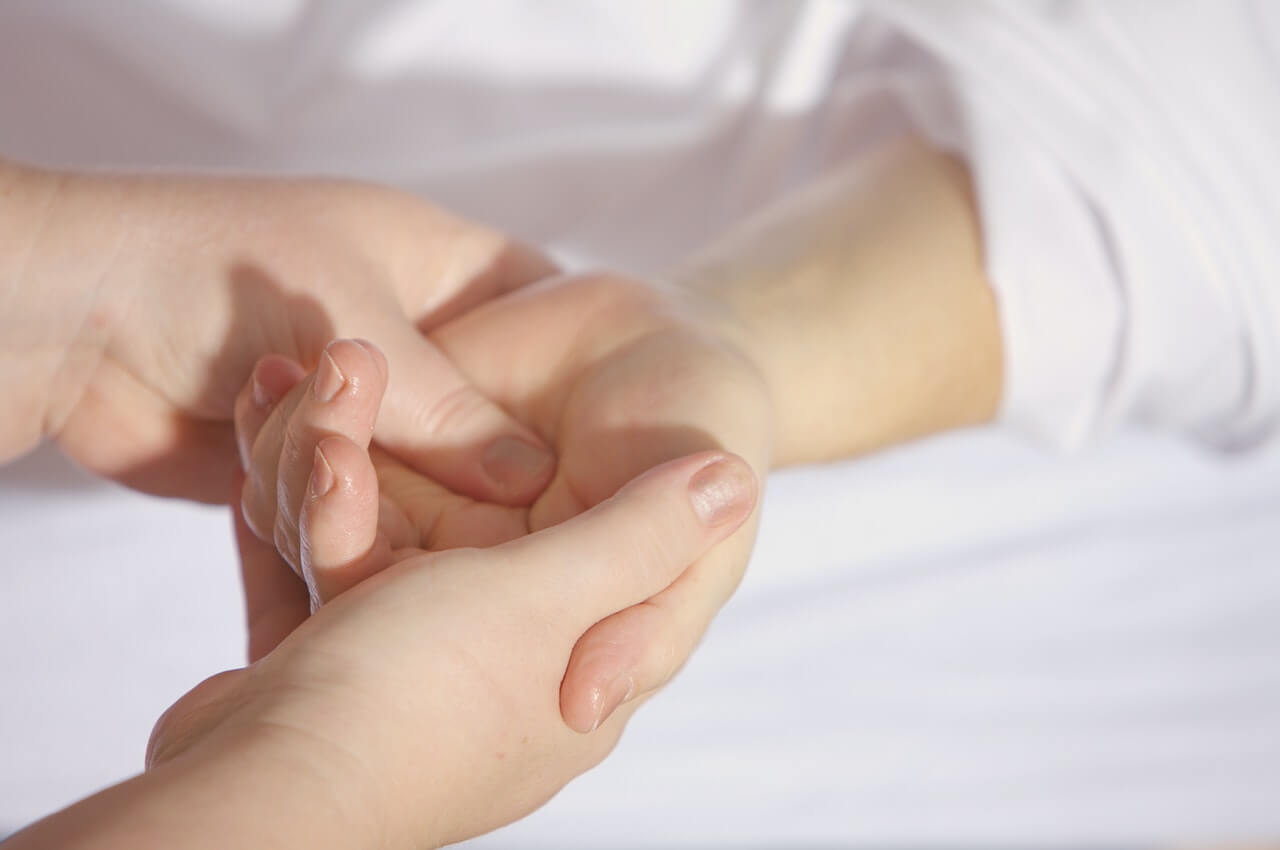 Hand being massaged during a treatment